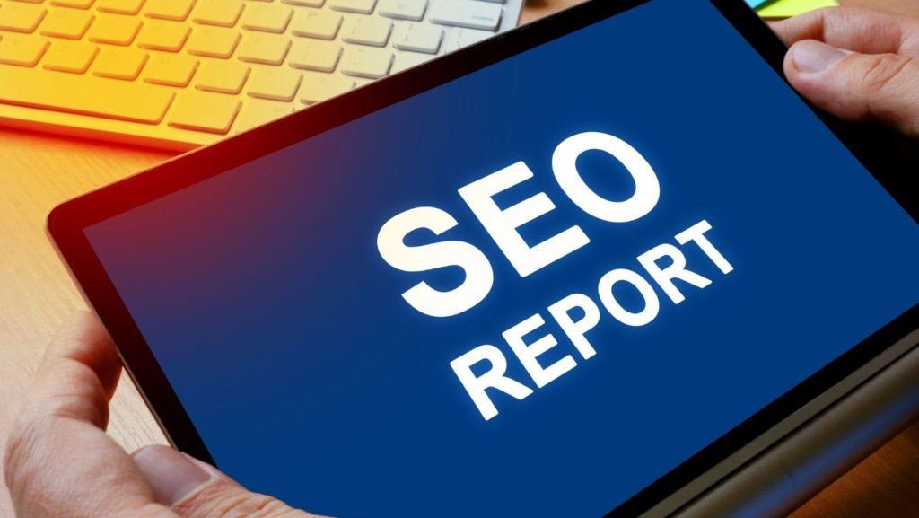 Tablet with SEO report text on it