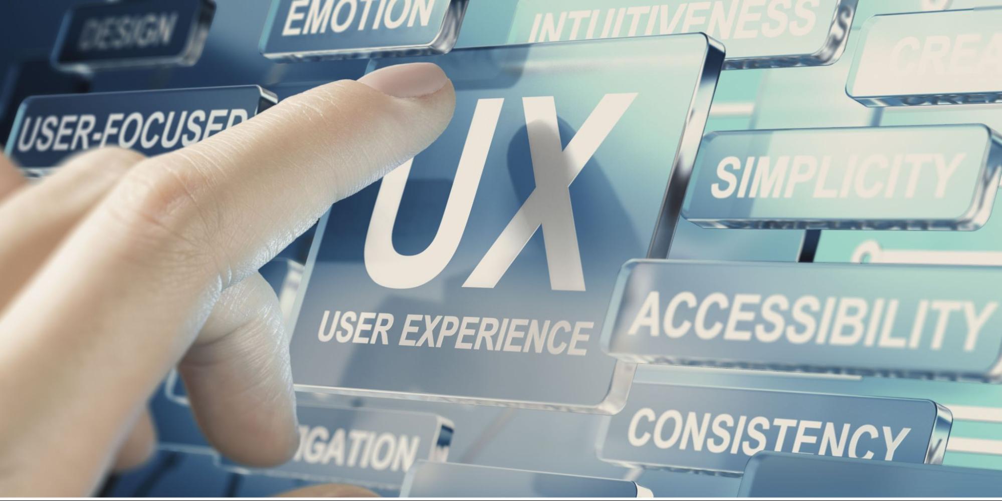 An index finger pressing a digital button for UX user Experience with other information architecture terms surrounding it.